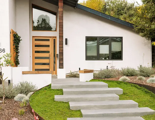 An eco-friendly yard with a stone block pathway