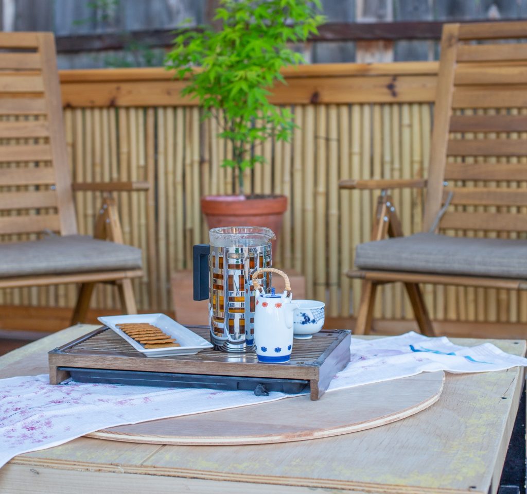 Tea ceremony set arranged on the bamboo deck