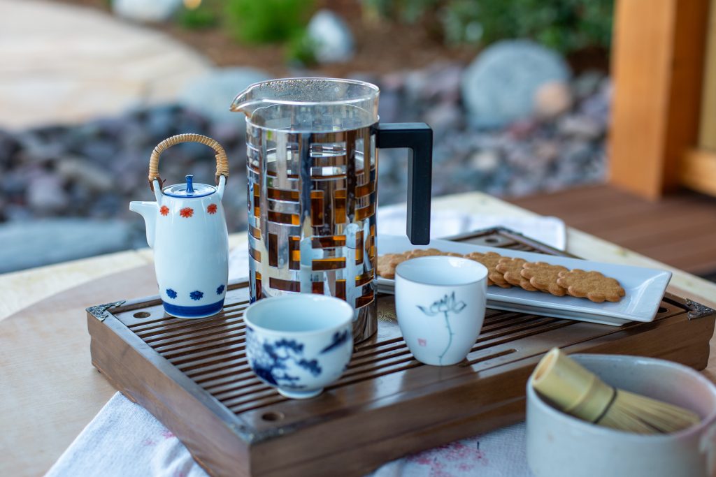 Close-up of the tea service on a wooden tray