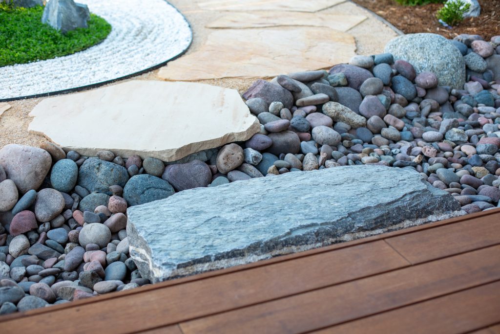 Swale with boulders and a bamboo deck