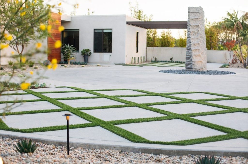 Modern San Diego estate landscape with geometric concrete pavers