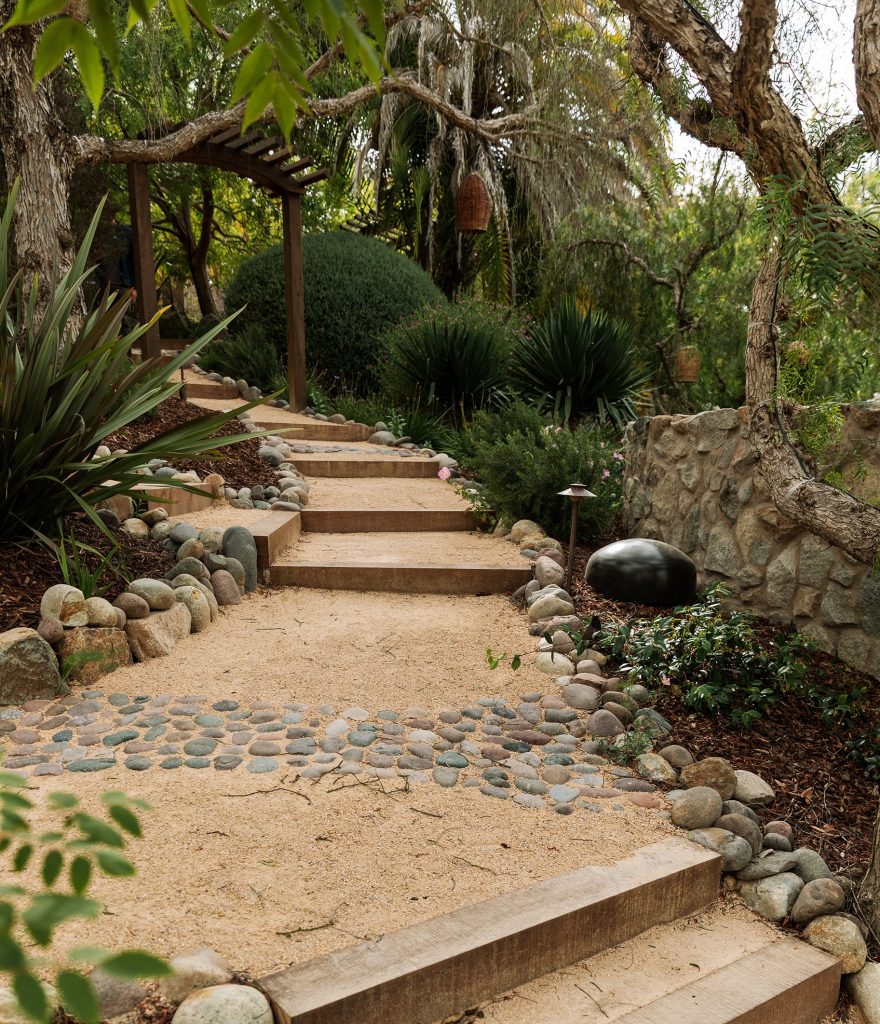 DG pathway with cobble ribbons and timber steps